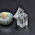 СРЕБЪРЕН ПРЪСТЕН С ЛАБРАДОРИТ И АЖУРНИ МОТИВИ